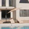 10ft Double Top Round Cantilever Umbrella-Beige by the lake