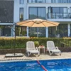 10ft Round Offset Hanging Umbrella-Beige by the poolside