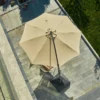 11ft Round Curved Offset Hanging Umbrella with Base-Beige in the park