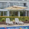 8 x 8ft Square Offset Hanging Umbrella with Base-Beige by the poolside