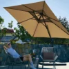 A woman relaxing under the 10 x 10ft Double Top Square Cantilever Umbrella-Beige