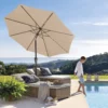 Beige Round Tilt Patio Umbrella by the pool