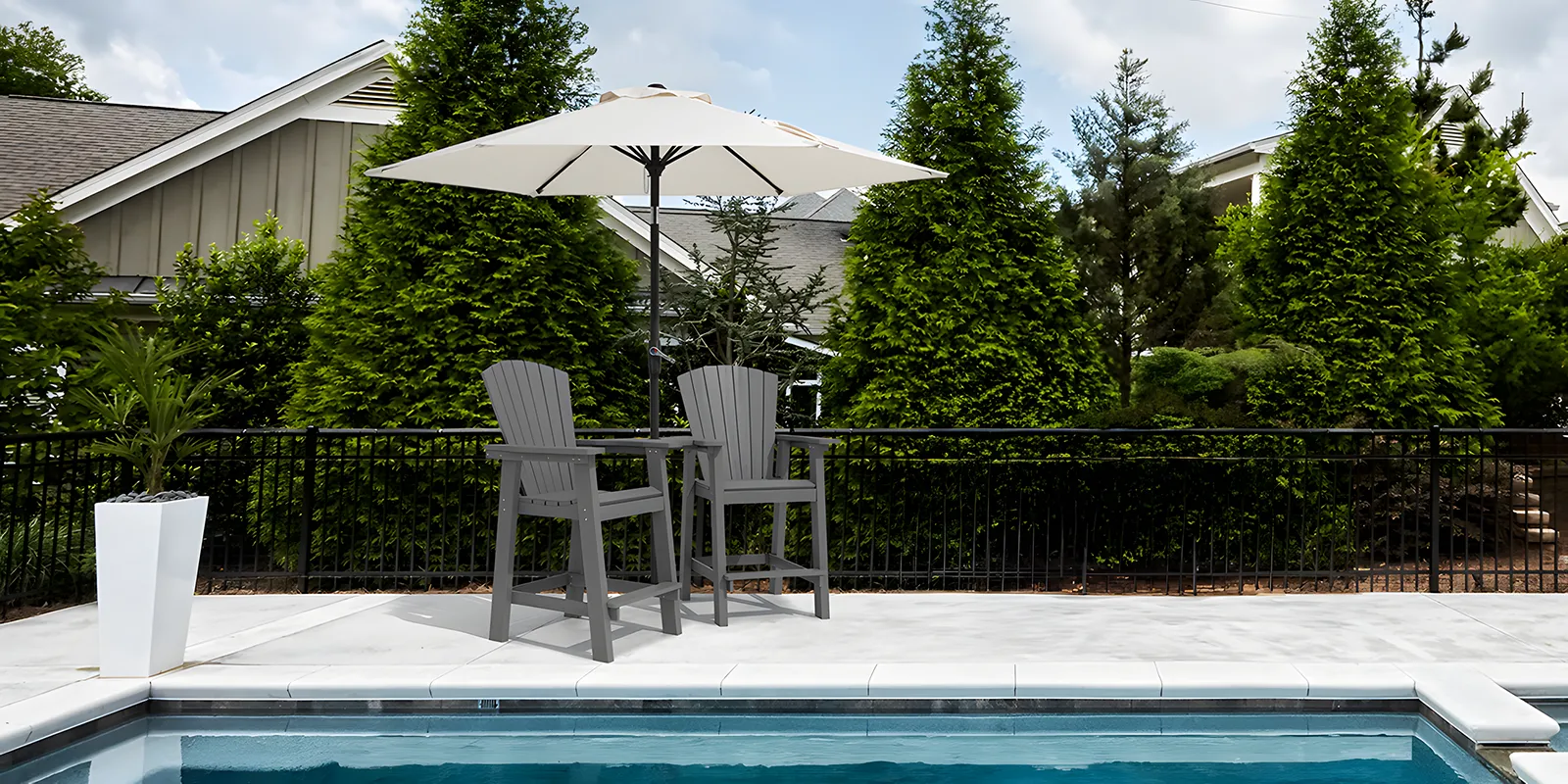 Joint Bar Height Adirondack Chairs with Connecting Table by the Pool