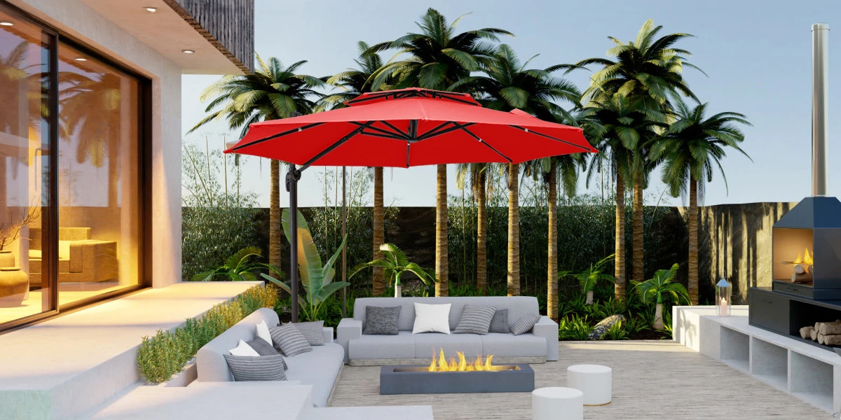 The red 10 ft cantilever umbrella shades a gray sofa set