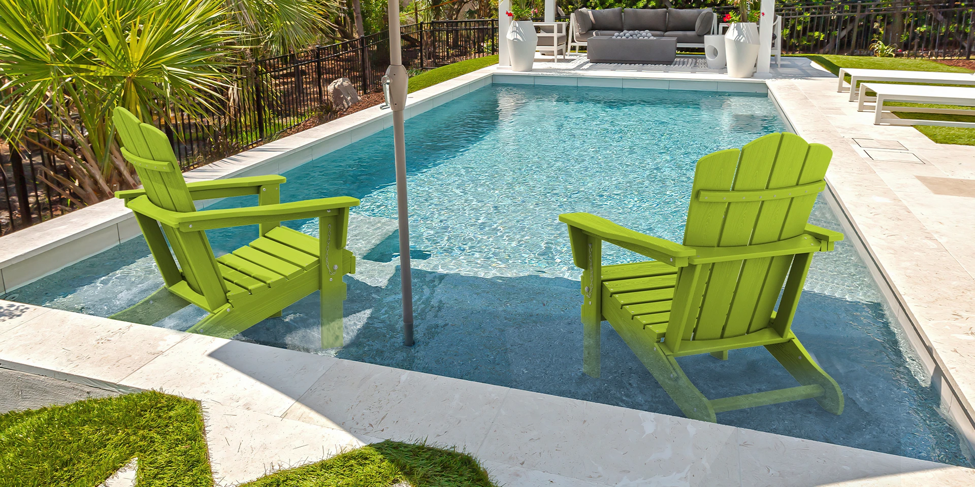 Two Kingyes folding adirondack chairs in the pool