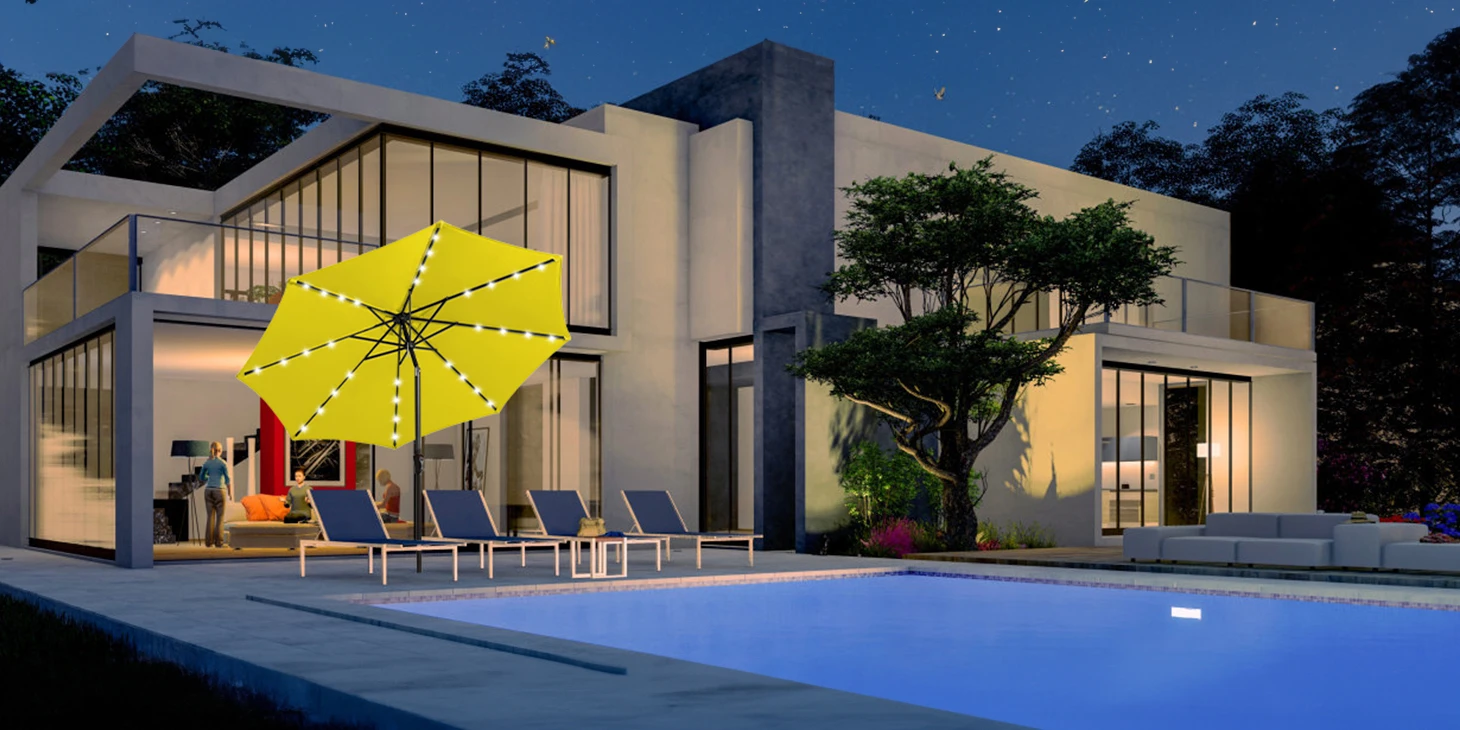 There is a yellow patio umbrella with led lights beside the swimming pool.