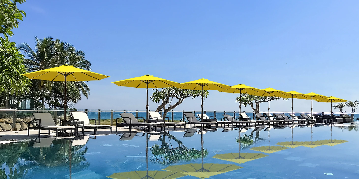 Yellow 9ft Tilting Patio Umbrella by the Pool