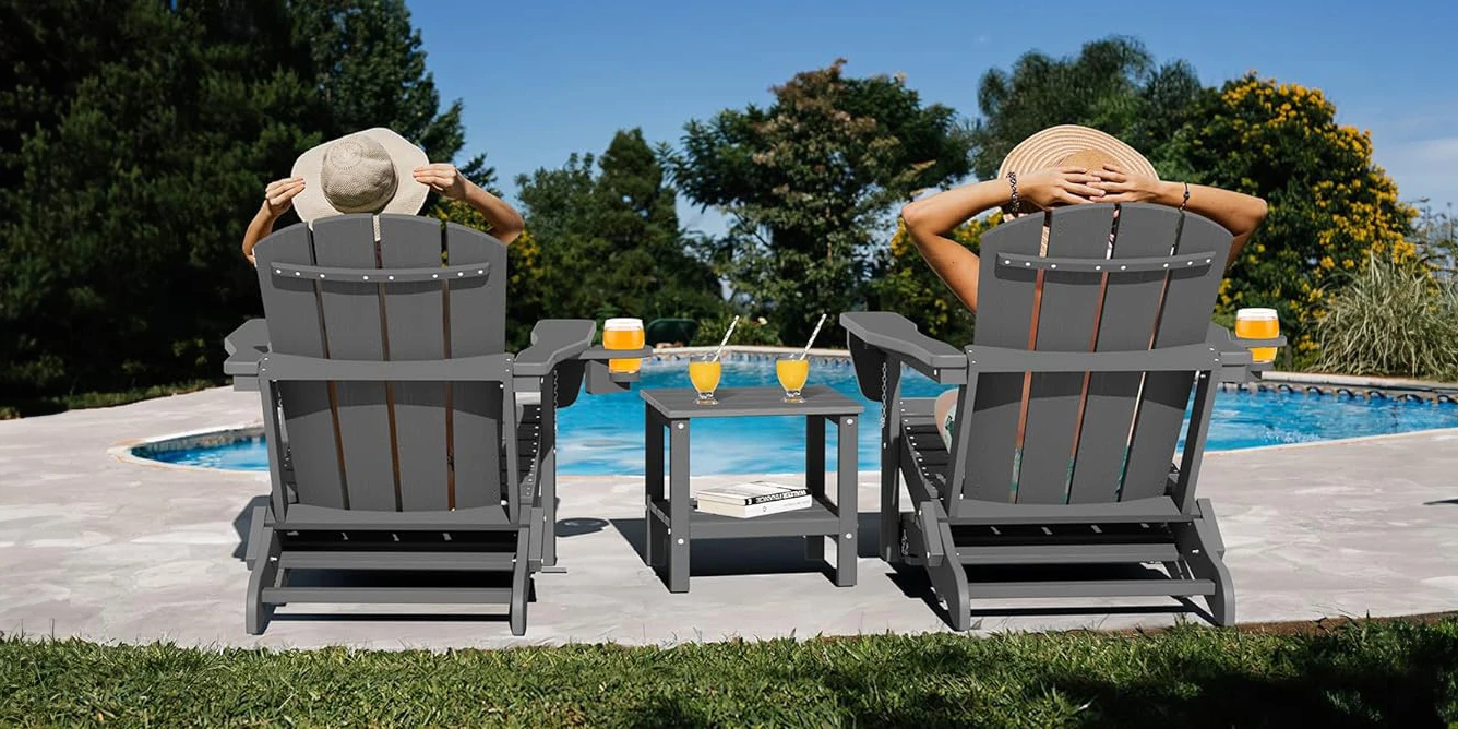 Two girl sitting on the reclining Adirondack chairs set
