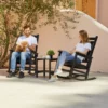 A couple resting on the Traditional Porch Rocking Chair-Dark Gray on the patio