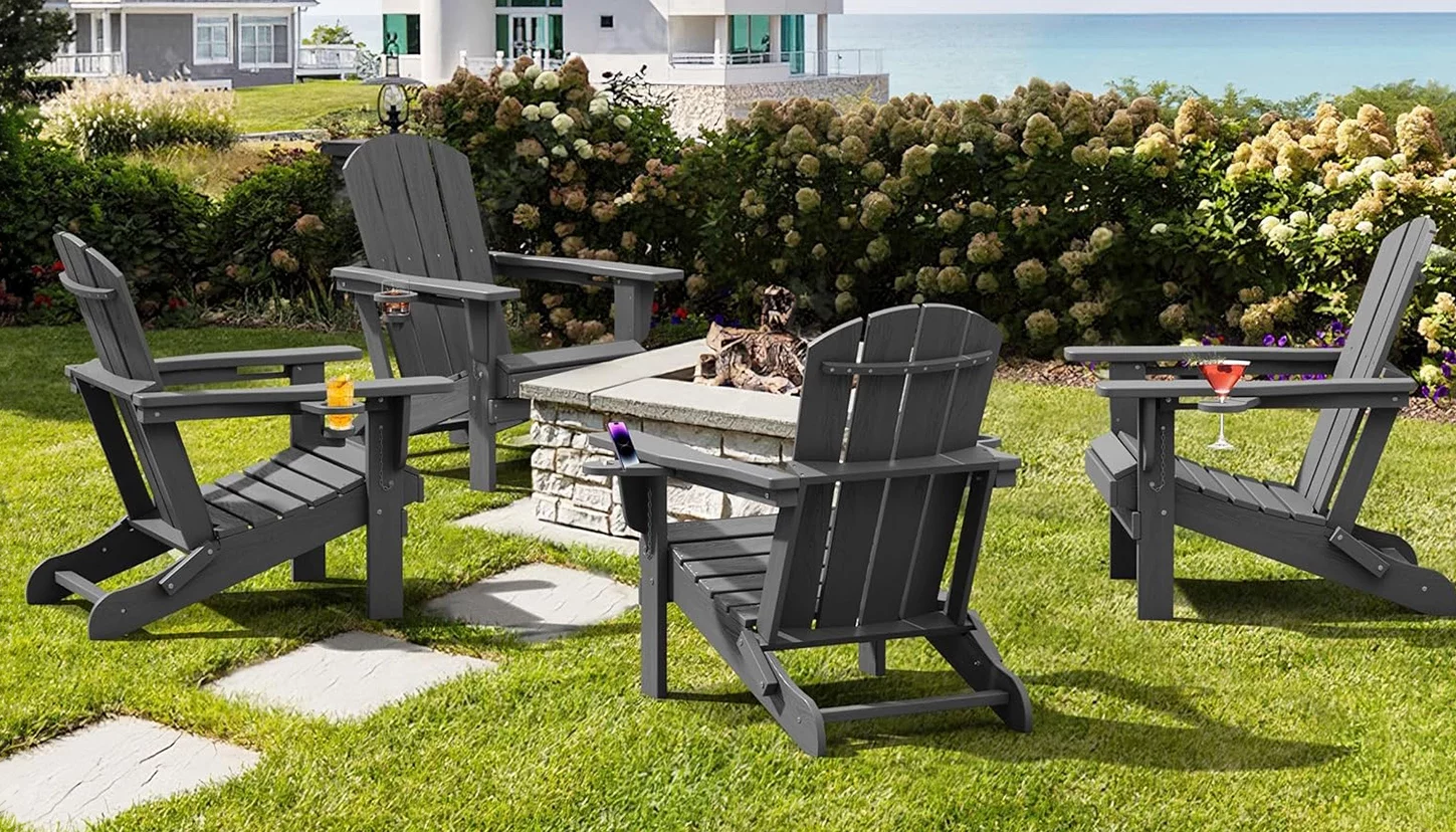 Four Classic Folding Adirondack Chairs on the Garden