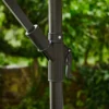 The angle adjustment system of the10ft Round Offset Hanging Umbrella with Base