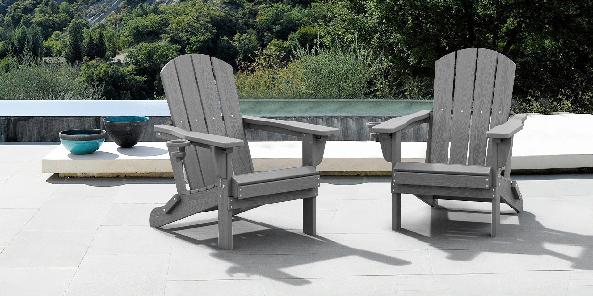 Two Dark Gray Reclining Folding Adirondack Chairs