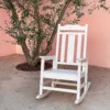 White Vintage Porch Rocking Chair under a tree