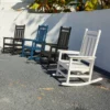 four different colored Classic Porch Presidential Rocking Chairs in the patio