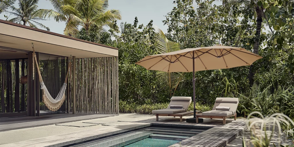 Beige 9 x 15 ft Large Double-sided Patio Market Umbrella by the Pool