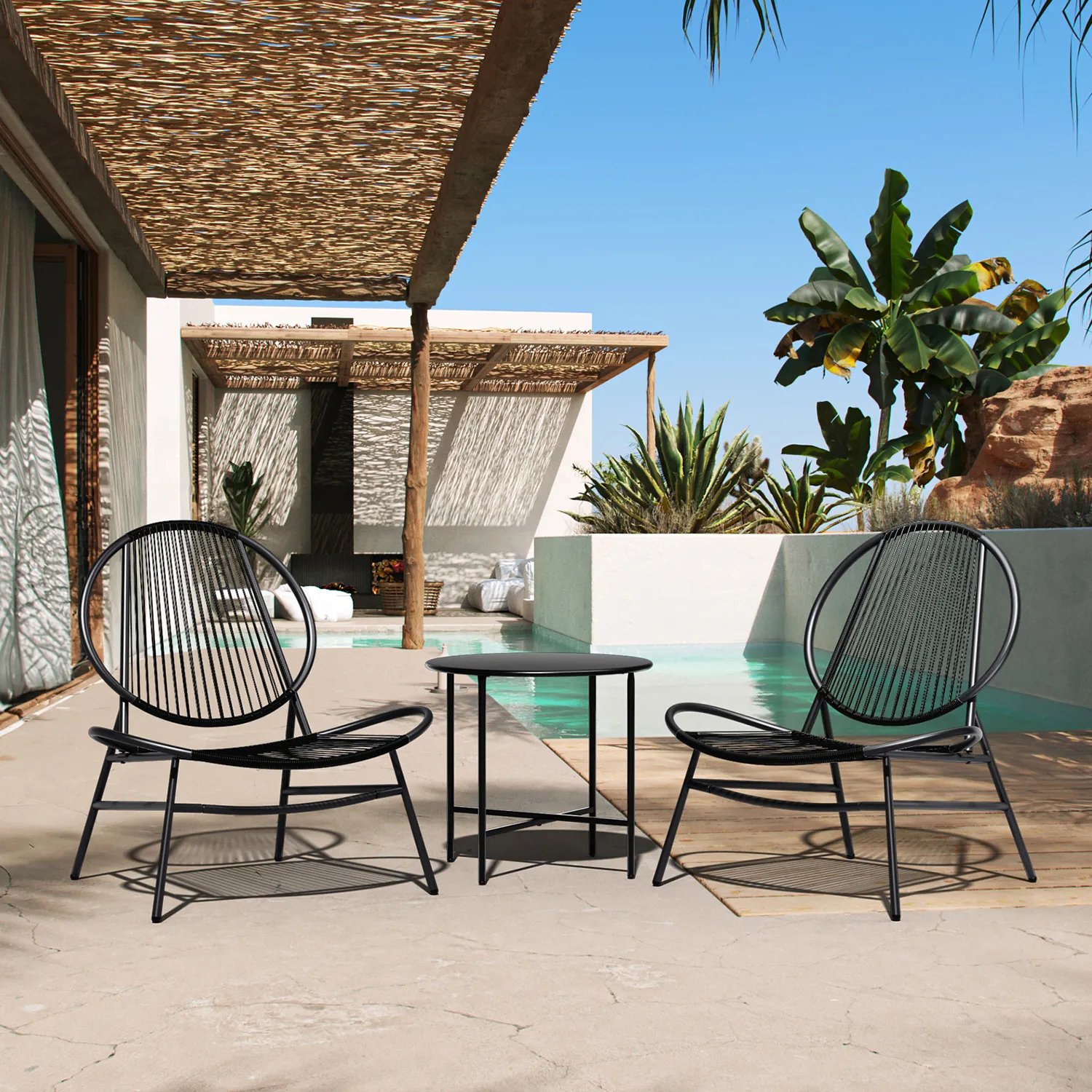 3-Piece Round Rattan Patio Bistro Set with Side Table-Black on the patio