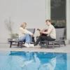 A couple dating on the HDPE Mesh Reclining Chaise Lounge with Wheels-Dark Gray
