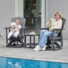 A mother and her daughter sitting on the Outdoor Adirondack Swivel Glider Chair by the poolside
