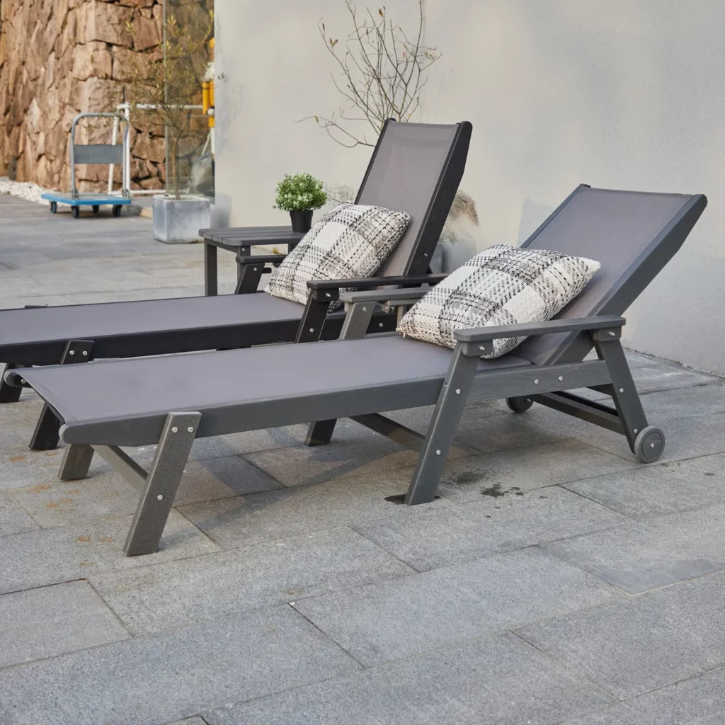 HDPE Mesh Reclining Chaise Lounge with Wheels-Dark Gray by the poolside