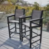 Outdoor HDPE Mesh Bar Height Armchair Set of 2-Black on the terrace