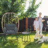 Patio Wicker Lounge Egg Chair Set with Side Table-Dark Gray at the front yard