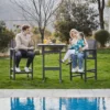 a family of three eating on the Outdoor HDPE Mesh 3-Piece Bar Height Armchair and Table Set-Dark Gray