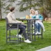 a family of three resting on the Outdoor HDPE Mesh 3-Piece Bar Height Armchair and Table Set-Dark Gray